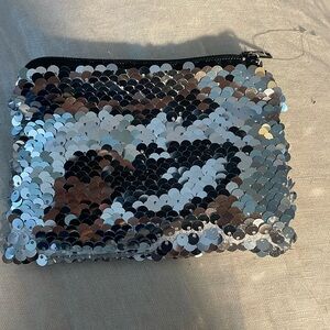 Sequin coin pouch with tag… Brand new